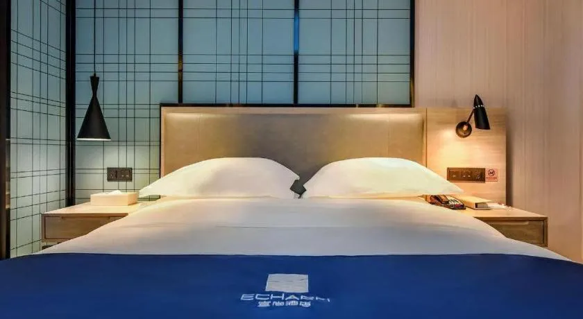 Bed in Echarm Hotel Anshun High-speed Railway Station Jichang Road