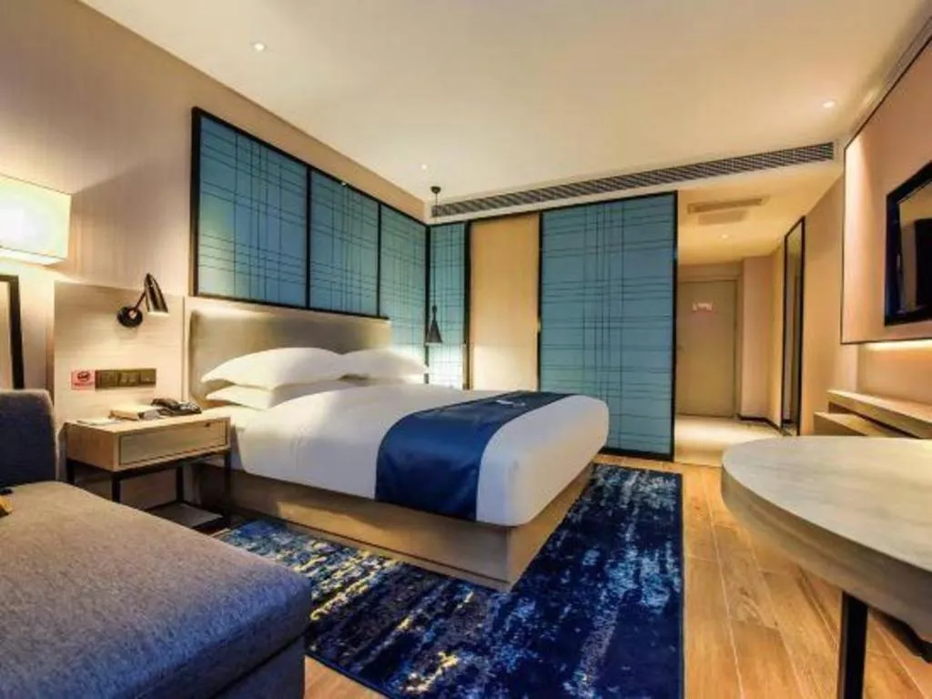 Bed in Echarm Hotel Anshun High-speed Railway Station Jichang Road