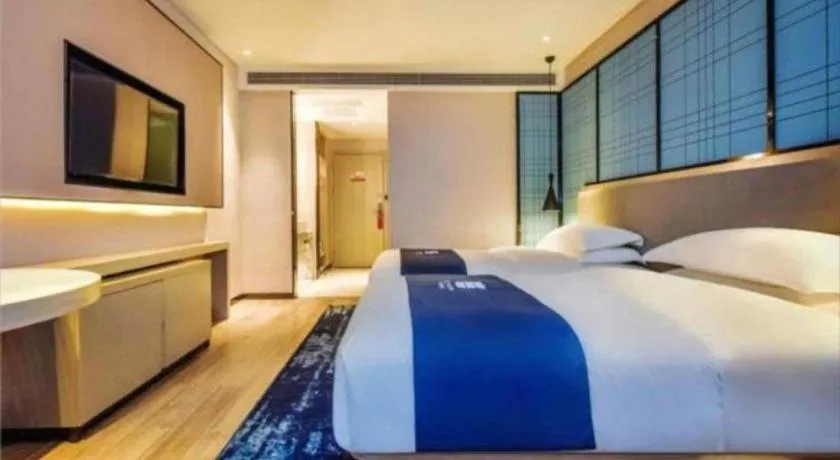 Bed in Echarm Hotel Anshun High-speed Railway Station Jichang Road