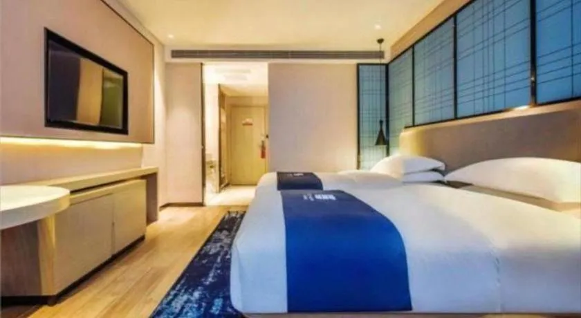 Bed in Echarm Hotel Anshun High-speed Railway Station Jichang Road