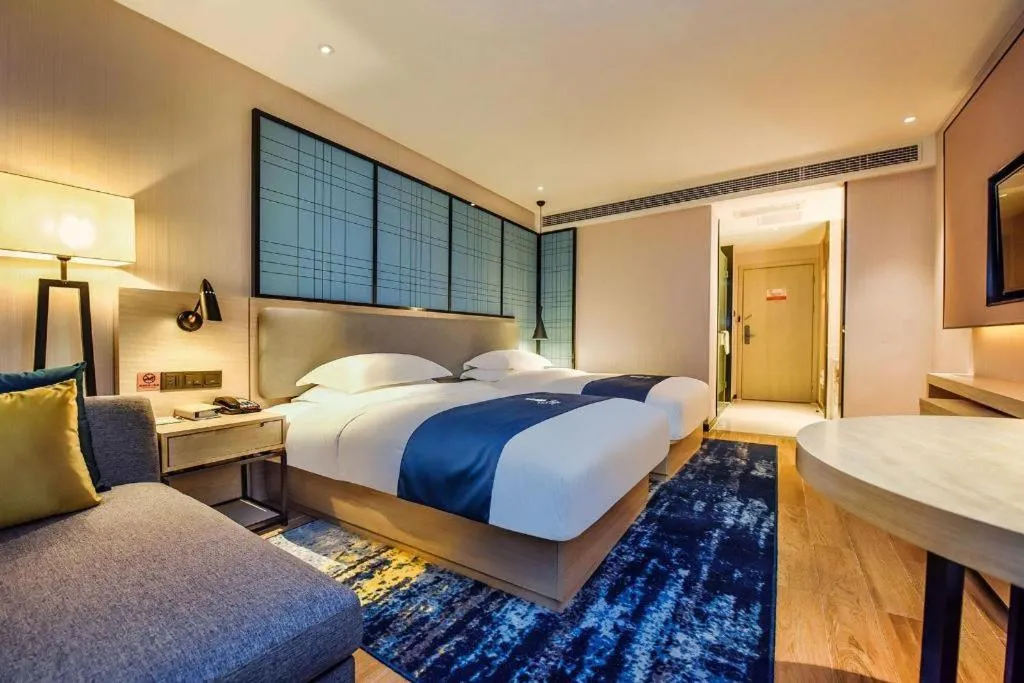 Bed in Echarm Hotel Anshun High-speed Railway Station Jichang Road