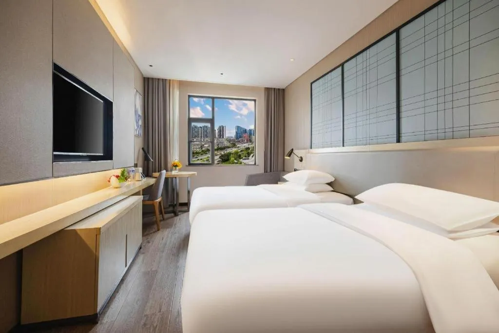 Bed in Echarm Hotel Wuhan Hankou Station Changgang Road Metro Station