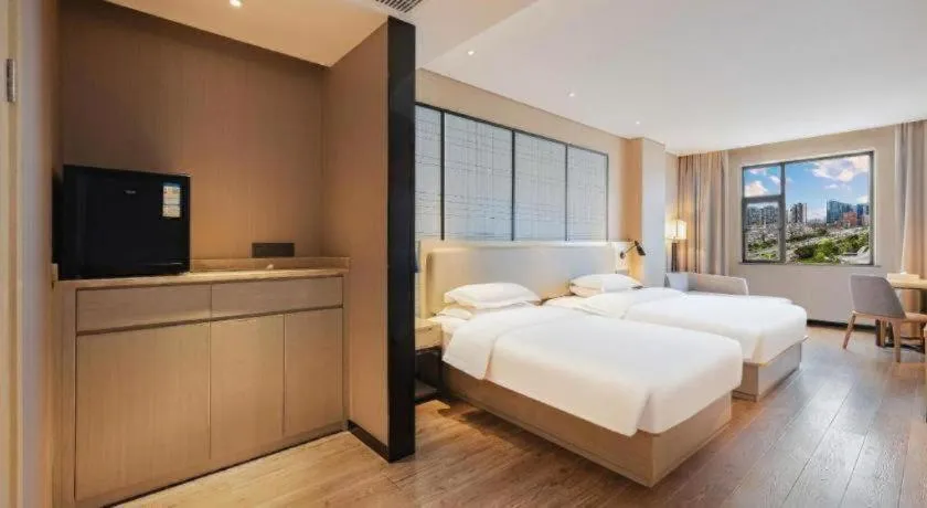 Bed in Echarm Hotel Wuhan Hankou Station Changgang Road Metro Station