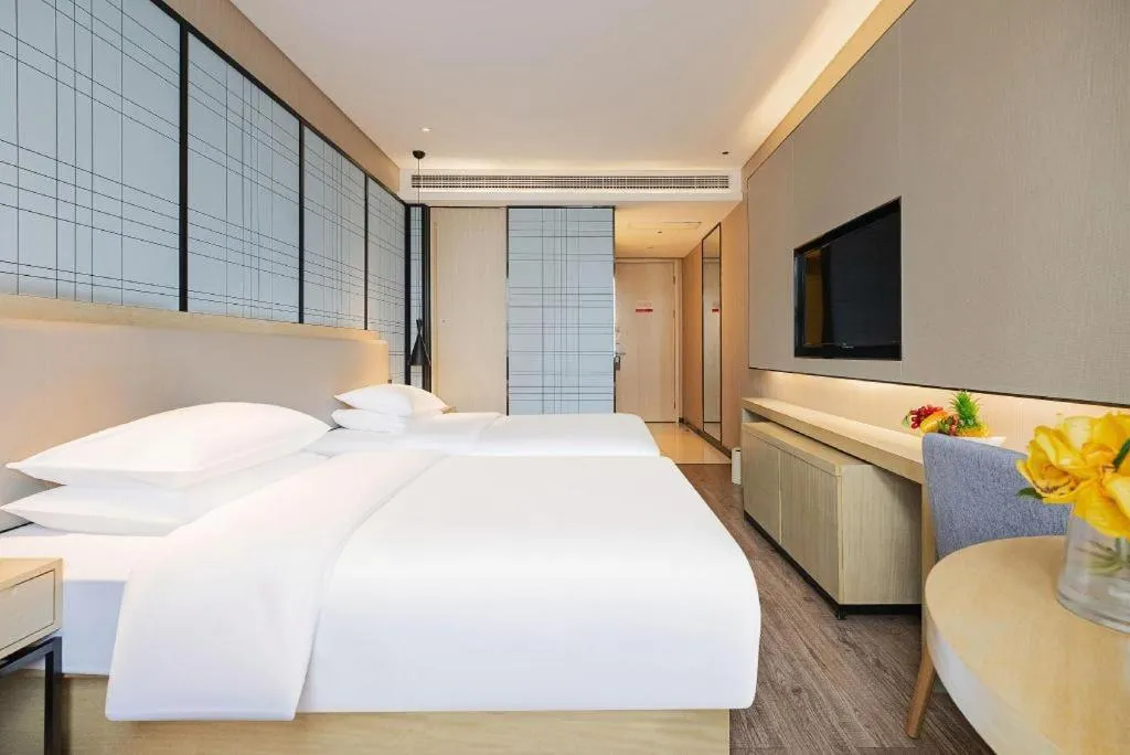 Bed in Echarm Hotel Wuhan Hankou Station Changgang Road Metro Station