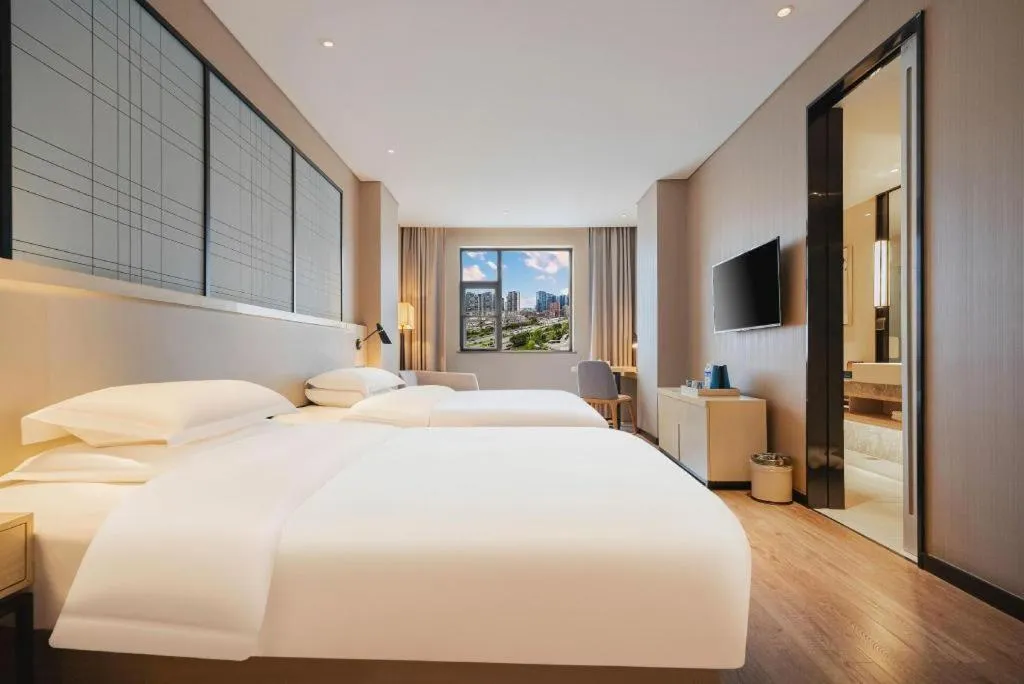 Bed in Echarm Hotel Wuhan Hankou Station Changgang Road Metro Station