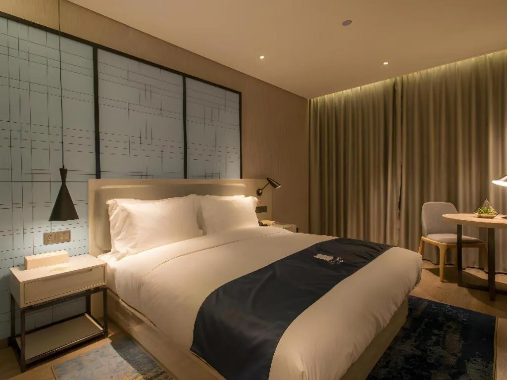 Bed in Echarm Hotel Wuhan Hankou Station Changgang Road Metro Station