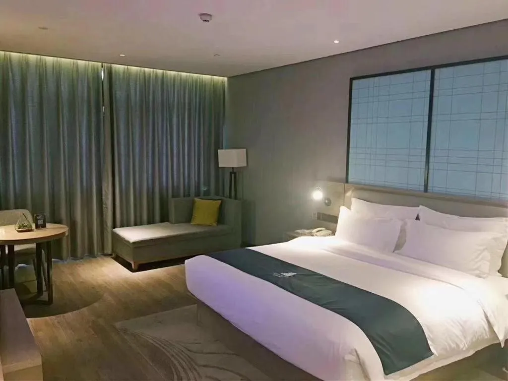 Bed in Echarm Hotel Wuhan Hankou Station Changgang Road Metro Station