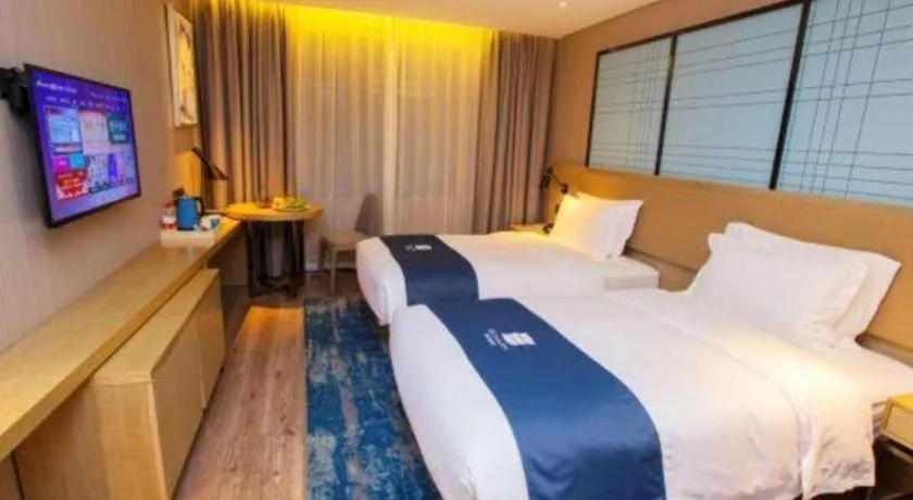 Bed in Echarm Hotel Nanning Guangxi University Xinyang Longteng District Maternal and Child Hospital