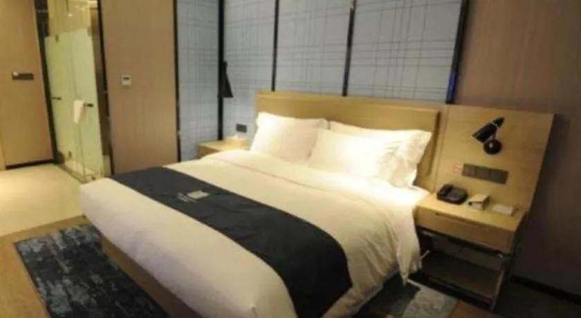 Bed in Echarm Hotel Nanning Guangxi University Xinyang Longteng District Maternal and Child Hospital