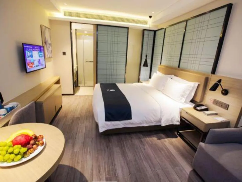 Bed in Echarm Hotel Nanning Guangxi University Xinyang Longteng District Maternal and Child Hospital