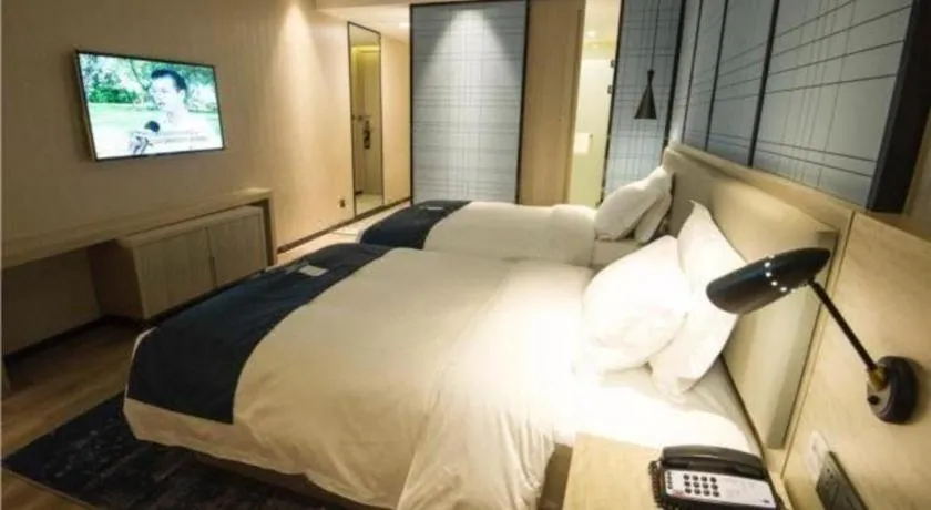 Bed in Echarm Hotel Nanning Guangxi University Xinyang Longteng District Maternal and Child Hospital