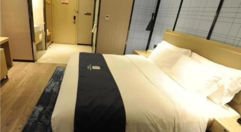 Bed in Echarm Hotel Nanning Guangxi University Xinyang Longteng District Maternal and Child Hospital