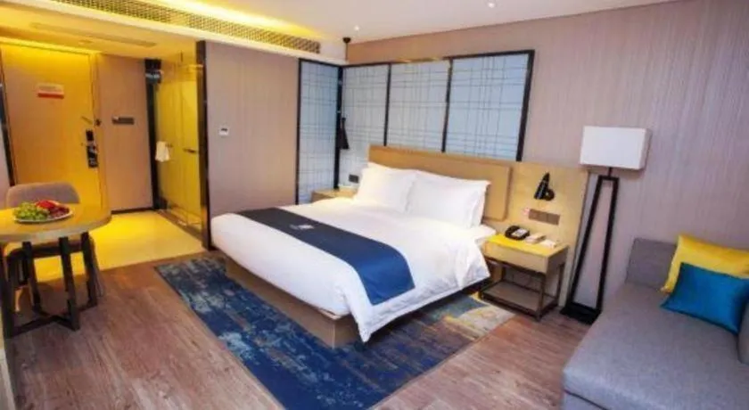 Bed in Echarm Hotel Nanning Guangxi University Xinyang Longteng District Maternal and Child Hospital