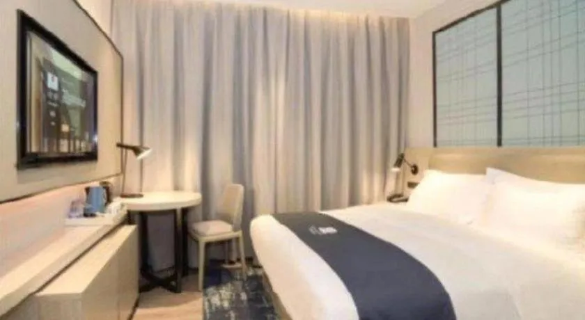 Bed in Echarm Hotel Nanning Guangxi University Xinyang Longteng District Maternal and Child Hospital