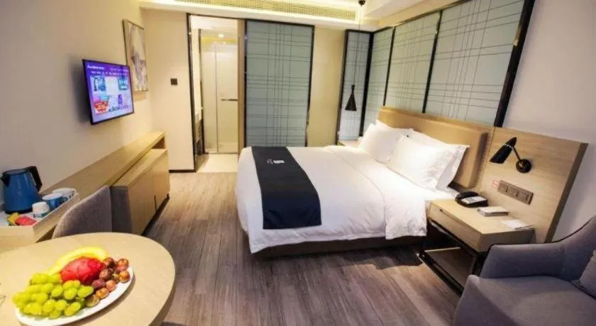 Bed in Echarm Hotel Nanning Guangxi University Xinyang Longteng District Maternal and Child Hospital