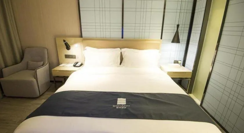 Bed in Echarm Hotel Nanning Guangxi University Xinyang Longteng District Maternal and Child Hospital