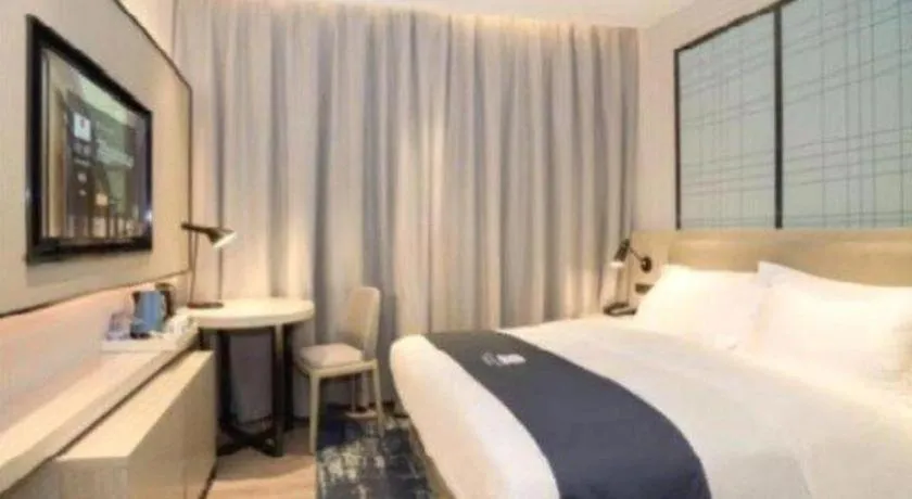 Bed in Echarm Hotel Nanning Guangxi University Xinyang Longteng District Maternal and Child Hospital