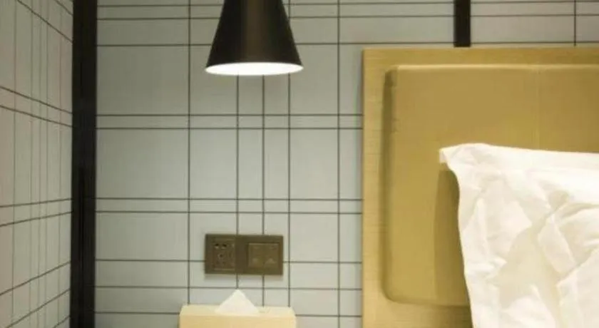 Bed in Echarm Hotel Nanning Guangxi University Xinyang Longteng District Maternal and Child Hospital