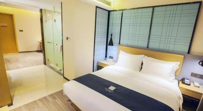 Bed in Echarm Hotel Nanning Guangxi University Xinyang Longteng District Maternal and Child Hospital