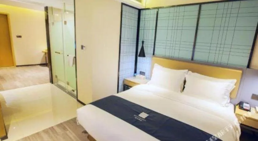 Bed in Echarm Hotel Nanning Guangxi University Xinyang Longteng District Maternal and Child Hospital