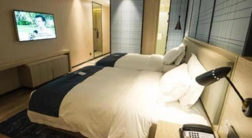 Bed in Echarm Hotel Nanning Guangxi University Xinyang Longteng District Maternal and Child Hospital