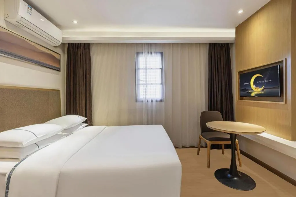 Bed in City Comfort Inn Wuhan Jianghan Road Liuduqiao Metro Station