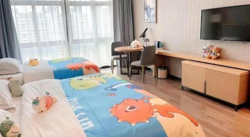 Bed in Echarm Hotel Liuzhou Liunan Wanda Plaza