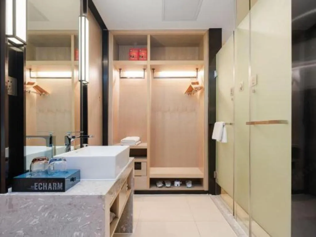 Bed in Echarm Hotel Liuzhou Liunan Wanda Plaza