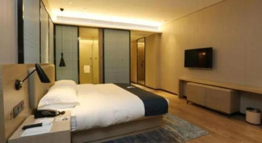 Bed in Echarm Hotel Liuzhou Liunan Wanda Plaza