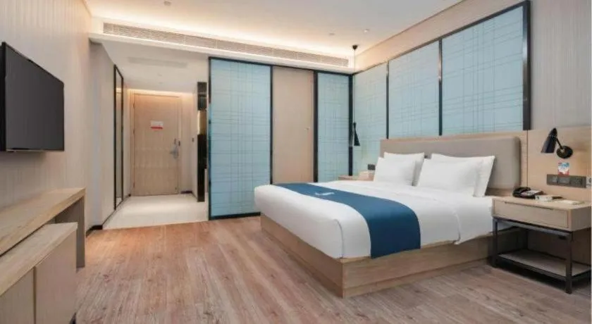Bed in Echarm Hotel Liuzhou Liunan Wanda Plaza