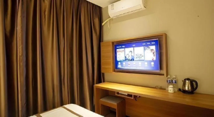 Bed in Jtour Inn Huanggang Wuxue City Square