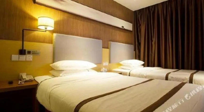 Bed in Jtour Inn Huanggang Wuxue City Square