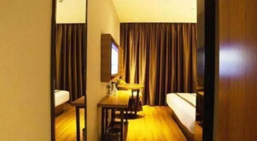 Bed in Jtour Inn Huanggang Wuxue City Square