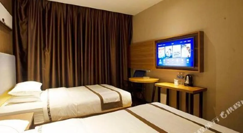 Bed in Jtour Inn Huanggang Wuxue City Square