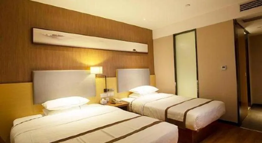 Bed in Jtour Inn Huanggang Wuxue City Square