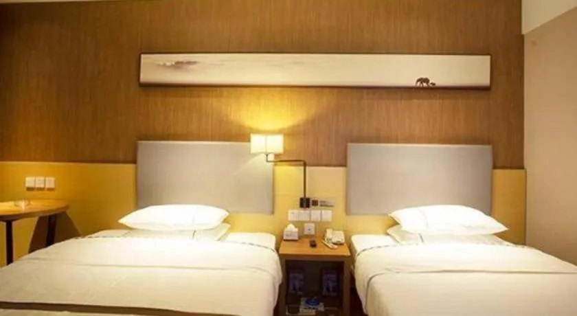 Bed in Jtour Inn Huanggang Wuxue City Square