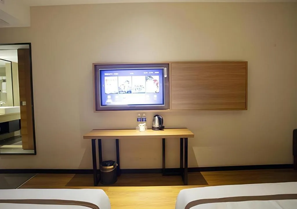 Bed in Jtour Inn Huanggang Wuxue City Square