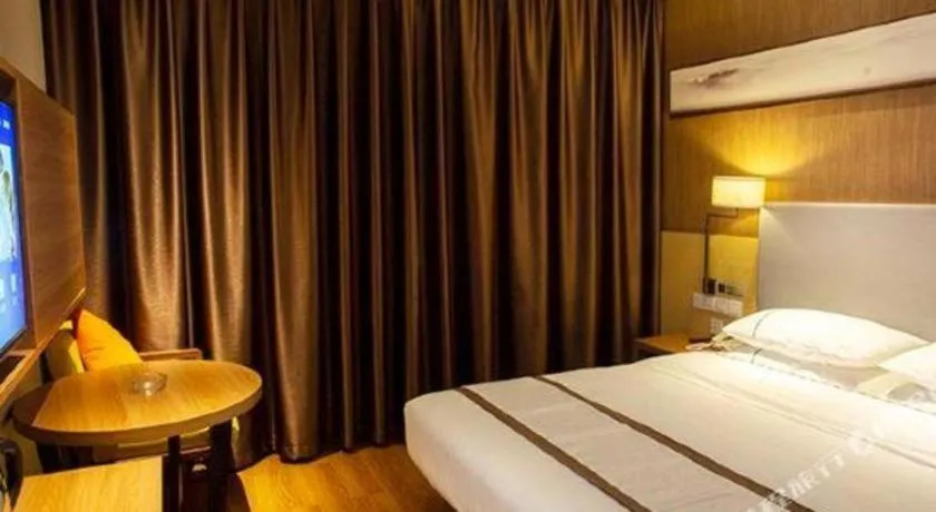 Bed in Jtour Inn Huanggang Wuxue City Square