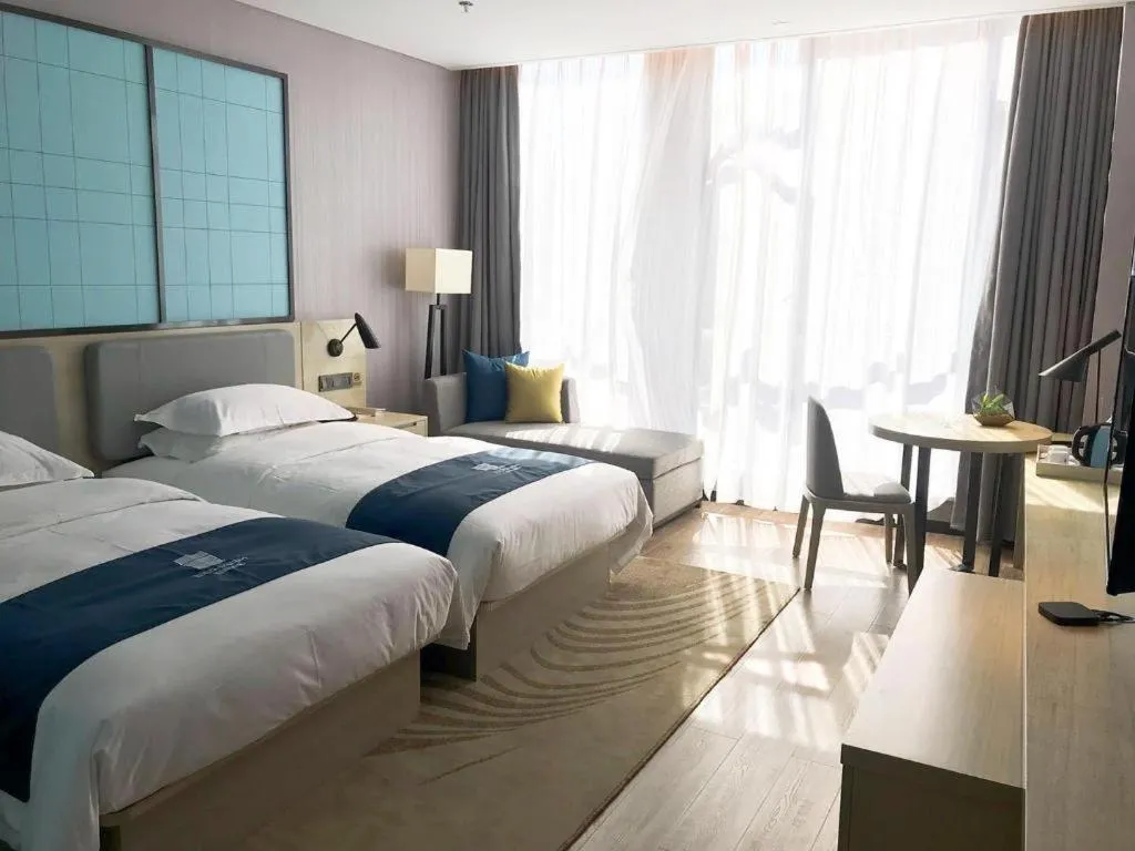 Bed in Echarm Hotel An'xi Hengxing Coach Station