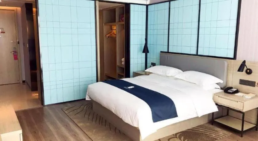 Bed in Echarm Hotel An'xi Hengxing Coach Station