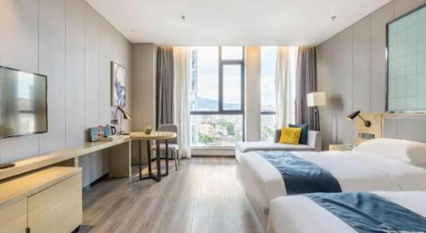 Bed in Echarm Hotel An'xi Hengxing Coach Station