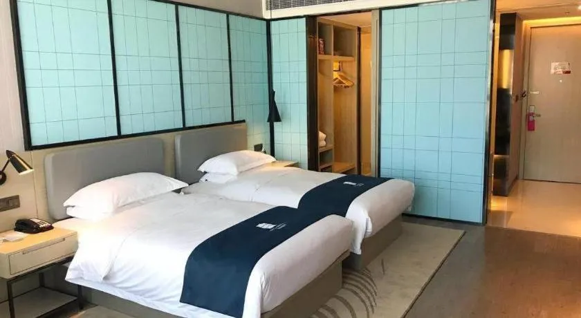 Bed in Echarm Hotel An'xi Hengxing Coach Station