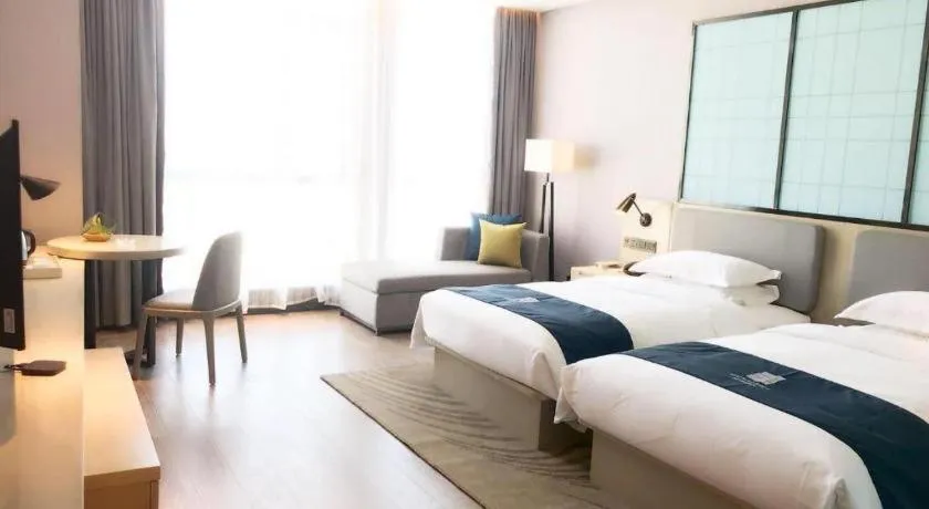 Bed in Echarm Hotel An'xi Hengxing Coach Station