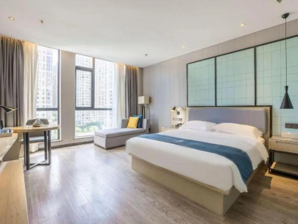 Bed in Echarm Hotel An'xi Hengxing Coach Station