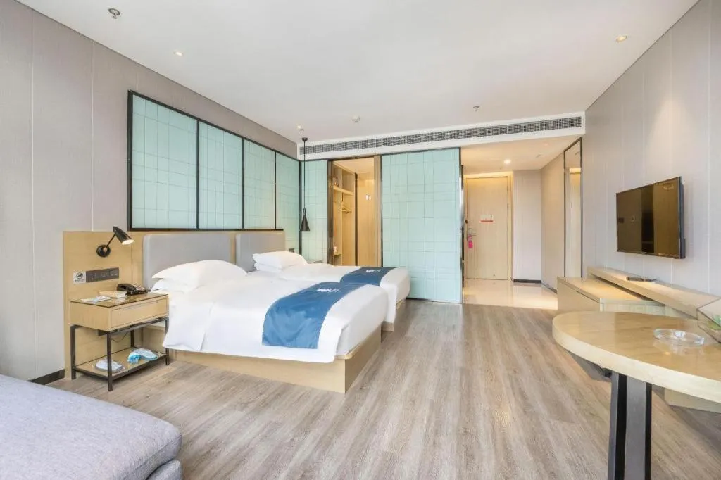 Bed in Echarm Hotel An'xi Hengxing Coach Station