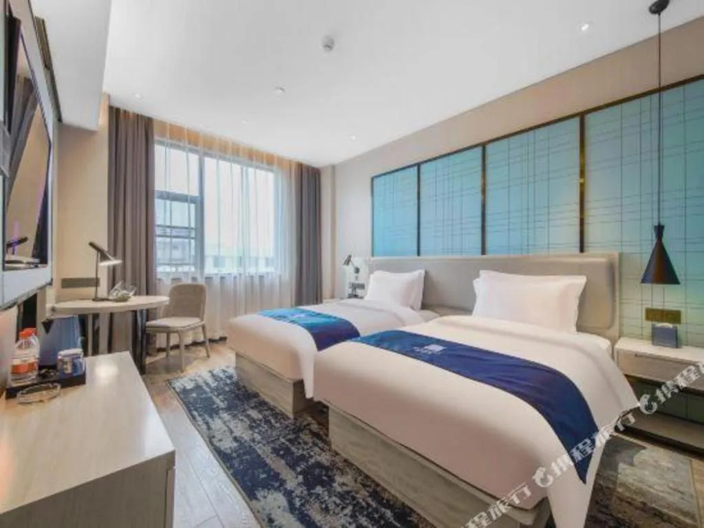 Bed in Echarm Hotel An'xi Hengxing Coach Station