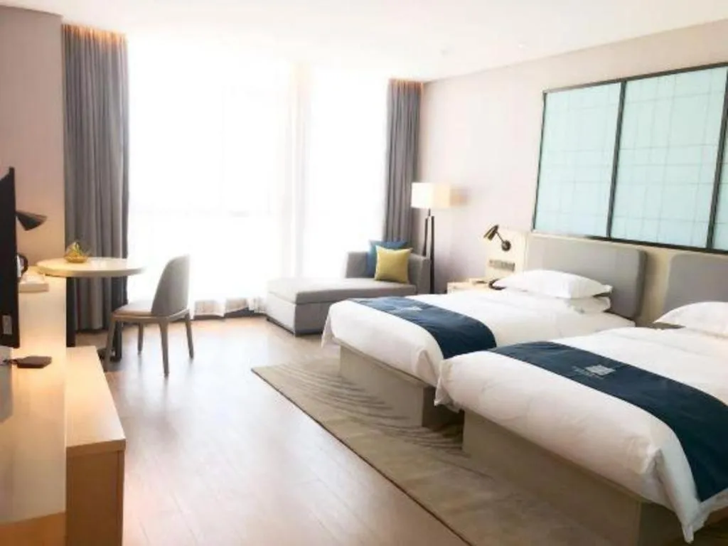 Bed in Echarm Hotel An'xi Hengxing Coach Station