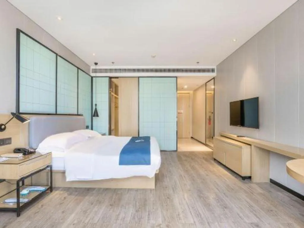 Bed in Echarm Hotel An'xi Hengxing Coach Station