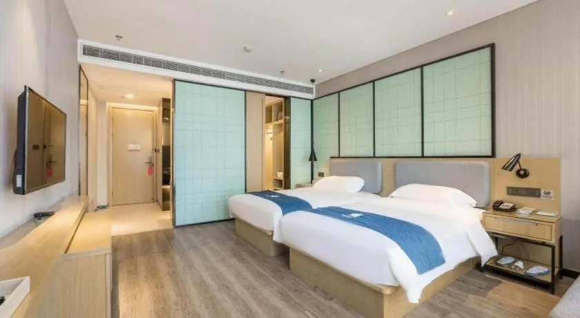 Bed in Echarm Hotel An'xi Hengxing Coach Station