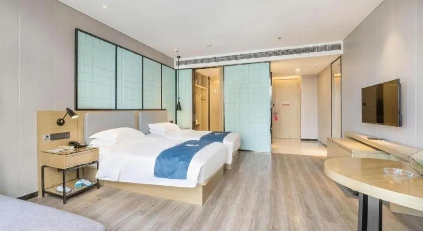 Bed in Echarm Hotel An'xi Hengxing Coach Station